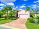 Single-Gathering home with a two-car garage and palm trees at 4139 63Rd E Ter, Sarasota, FL 34243