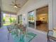 Enjoy this screened porch with access to both backyard and interior at 4139 63Rd E Ter, Sarasota, FL 34243