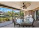 Spacious screened porch with seating area and lovely water views at 6435 Egret Ln # 409, Bradenton, FL 34210
