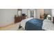 Comfortable bedroom with a queen bed and built-in wardrobe at 6435 Egret Ln # 409, Bradenton, FL 34210
