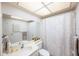 Bathroom with shower, sink, and toilet at 6435 Egret Ln # 409, Bradenton, FL 34210