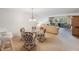 Bright dining area with glass table and four chairs at 6435 Egret Ln # 409, Bradenton, FL 34210