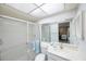 Clean bathroom with a shower/tub combo and vanity at 6435 Egret Ln # 409, Bradenton, FL 34210