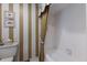 Neat bathroom with a toilet and step-in shower with modern fixtures at 8223 Regents Ct, University Park, FL 34201
