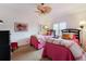 Guest bedroom with two twin beds and bright decor at 8223 Regents Ct, University Park, FL 34201
