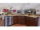 Spacious kitchen featuring stainless steel appliances and ample counter space at 8223 Regents Ct, University Park, FL 34201