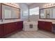 Elegant bathroom with double vanity, soaking tub, and ample storage at 4139 63Rd E Ter, Sarasota, FL 34243