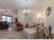 Relaxing sitting area featuring comfortable seating and hardwood floors at 4139 63Rd E Ter, Sarasota, FL 34243