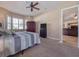 Comfortable bedroom with access to another room and plenty of natural light at 4139 63Rd E Ter, Sarasota, FL 34243
