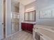 Spa-like bathroom featuring a large soaking tub and walk-in shower at 4139 63Rd E Ter, Sarasota, FL 34243