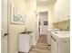 Laundry room with washer, dryer, and sink at 4139 63Rd E Ter, Sarasota, FL 34243