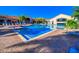 Large community pool surrounded by brick pavers at 4139 63Rd E Ter, Sarasota, FL 34243