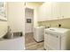 Laundry room with washer, dryer, and sink at 4139 63Rd E Ter, Sarasota, FL 34243