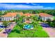 Aerial view of community clubhouse with fountain at 4139 63Rd E Ter, Sarasota, FL 34243