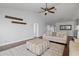 Spacious living room with hardwood floors, neutral decor, and access to backyard at 4818 61St Avenue W Ter, Bradenton, FL 34210