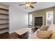 Home office with built-in shelving, hardwood floors, and neutral decor at 4818 61St Avenue W Ter, Bradenton, FL 34210