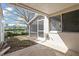 Relax on the covered patio, enjoying the view of the backyard at 4818 61St Avenue W Ter, Bradenton, FL 34210