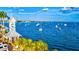 Scenic waterfront view with sailboats and a charming clock tower at 4818 61St Avenue W Ter, Bradenton, FL 34210