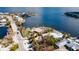 Aerial view of waterfront property, showcasing pool and dock at 543 Key Royale Dr, Holmes Beach, FL 34217