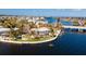 Aerial view of waterfront property with pool and boat dock at 543 Key Royale Dr, Holmes Beach, FL 34217