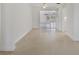 View of dining room and kitchen from entryway at 707 Park Ln, Bradenton, FL 34209