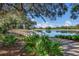 Picturesque wooden bridge over calm water at 8223 Regents Ct, University Park, FL 34201