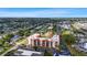 Aerial view of community featuring lush trees, water access and sprawling city views at 3006 Caring Way # 224, Port Charlotte, FL 33952