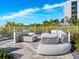 Relaxing fire pit area with comfortable seating at 4651 Gulf Of Mexico Dr # 402, Longboat Key, FL 34228