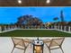 Evening view of a relaxing patio with seating area at 4651 Gulf Of Mexico Dr # 402, Longboat Key, FL 34228