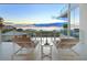Relaxing ocean view lounge area with comfortable seating and stunning sunset views at 4651 Gulf Of Mexico Dr # 402, Longboat Key, FL 34228