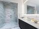 Contemporary bathroom with a marble shower and vanity at 4651 Gulf Of Mexico Dr # 402, Longboat Key, FL 34228