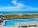 Resort-style pool with beach access and ocean views at 4651 Gulf Of Mexico Dr # 402, Longboat Key, FL 34228