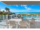 Oceanfront patio dining with stunning beach views at 4651 Gulf Of Mexico Dr # 402, Longboat Key, FL 34228