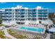 Luxury beachfront building with pool and ocean views at 4651 Gulf Of Mexico Dr # 402, Longboat Key, FL 34228