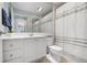 Clean bathroom with updated vanity and shower at 5793 Ithaca Way, Sarasota, FL 34238