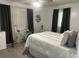 Inviting bedroom with a serene atmosphere, complemented by natural light at 6006 Hibiscus Dr # 6006, Bradenton, FL 34207