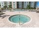 Relaxing hot tub nestled in the community at 800 N Tamiami Trl # 1603, Sarasota, FL 34236