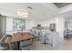 Modern kitchen with stainless steel appliances and a large island at 800 N Tamiami Trl # 1603, Sarasota, FL 34236