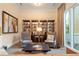 Quiet library with comfortable seating and bookshelves at 800 N Tamiami Trl # 1603, Sarasota, FL 34236