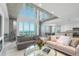 Open concept living area with city views and modern decor at 800 N Tamiami Trl # 1603, Sarasota, FL 34236
