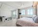 Main bedroom with city views and loft access at 800 N Tamiami Trl # 1603, Sarasota, FL 34236