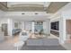 Modern living room with fireplace and city views at 800 N Tamiami Trl # 1603, Sarasota, FL 34236