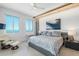 Main bedroom with city views and a ceiling fan at 800 N Tamiami Trl # 1603, Sarasota, FL 34236