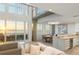 Modern kitchen with open concept design and water views at 800 N Tamiami Trl # 1603, Sarasota, FL 34236