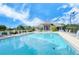 Relaxing pool area with lounge chairs at 9320 Clubside Cir # 2109, Sarasota, FL 34238