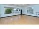 Bright exercise room with hardwood floors at 9320 Clubside Cir # 2109, Sarasota, FL 34238