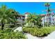 Two-story condo building with lush landscaping and walkways at 9320 Clubside Cir # 2109, Sarasota, FL 34238