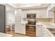 Kitchen with stainless steel appliances and white cabinets at 9320 Clubside Cir # 2109, Sarasota, FL 34238