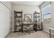 Home office with built-in shelving and window overlooking the backyard at 9869 Haze Dr, Venice, FL 34292