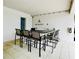Community outdoor bar with seating for residents at 9869 Haze Dr, Venice, FL 34292